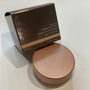 Becca under-eye brightening corrector in light to medium